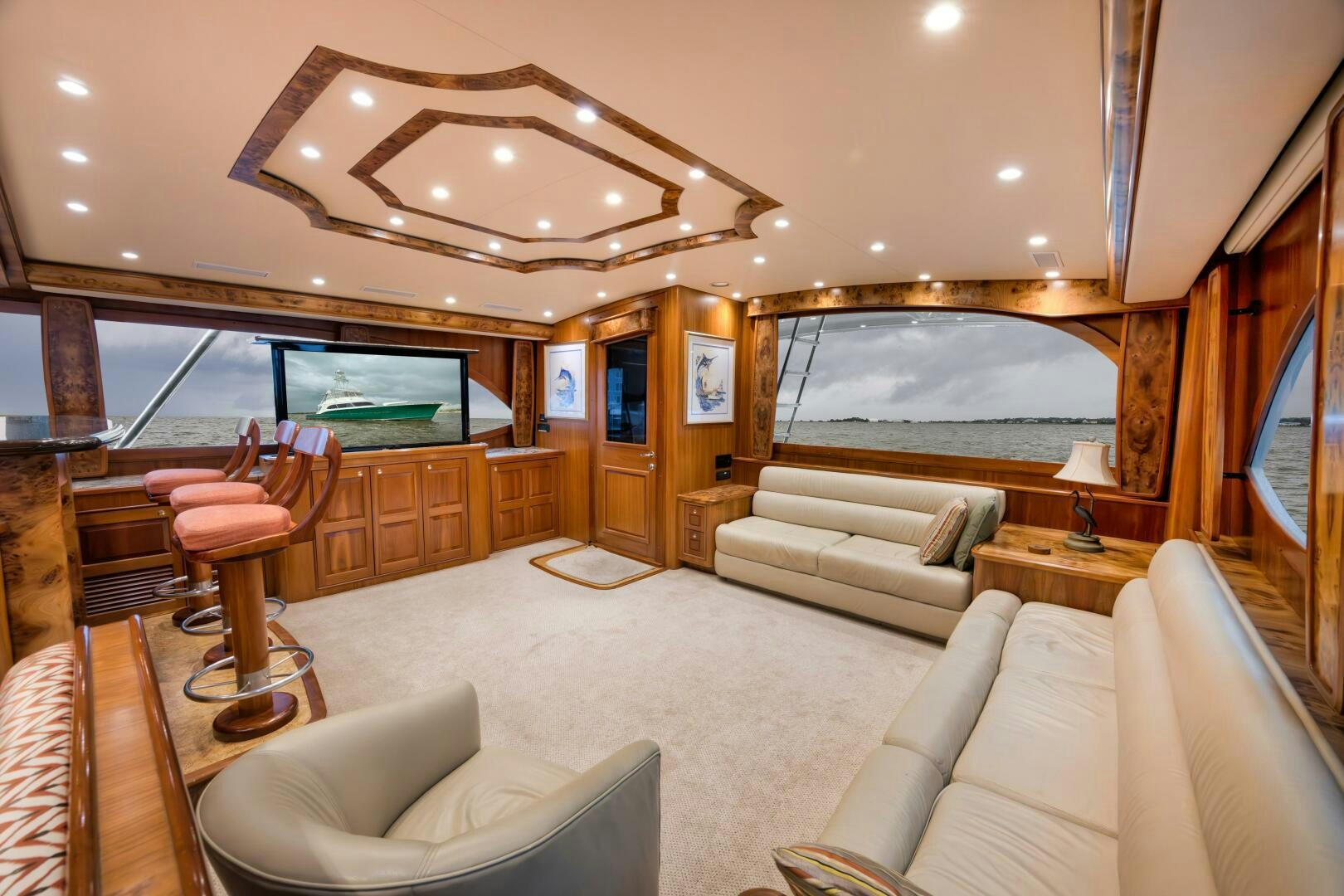 a living room with a large mirror aboard ANN WARRICK Yacht for Sale
