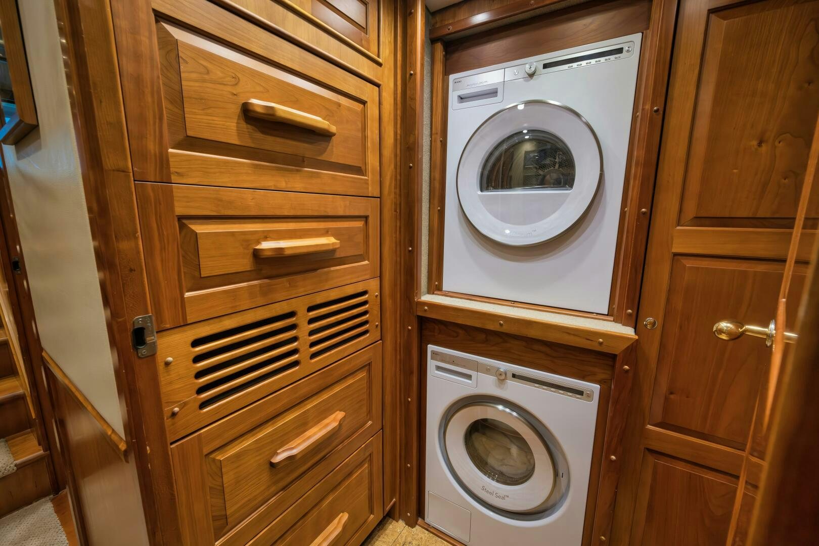 a closet with a washing machine aboard ANN WARRICK Yacht for Sale