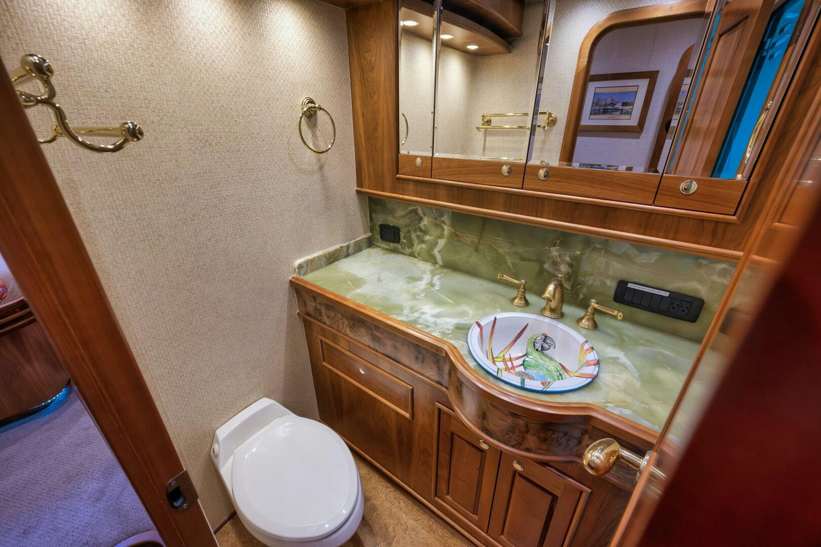 a bathroom with a sink and a toilet aboard ANN WARRICK Yacht for Sale