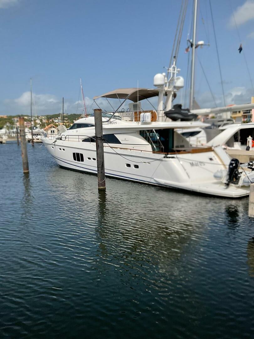 a boat docked at a pier aboard NONE Yacht for Sale