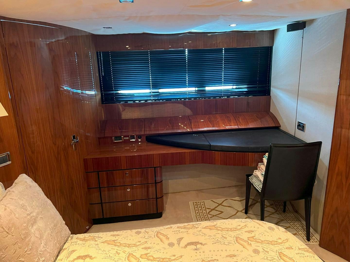 a room with a piano and a chair aboard NONE Yacht for Sale