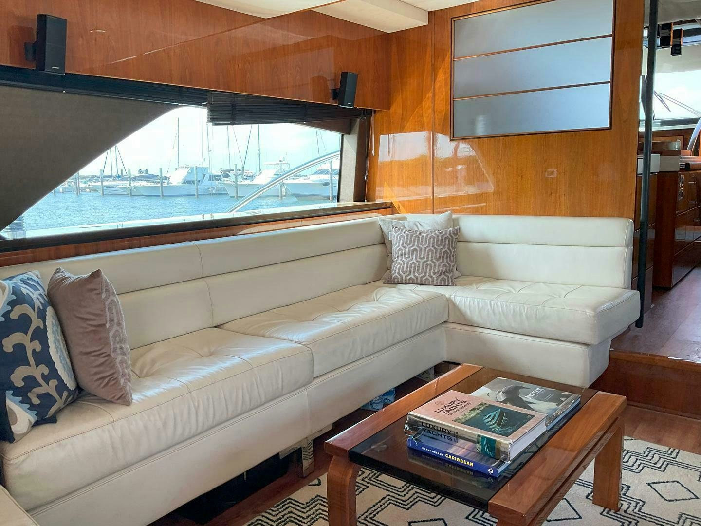 a living room with a large window aboard NONE Yacht for Sale