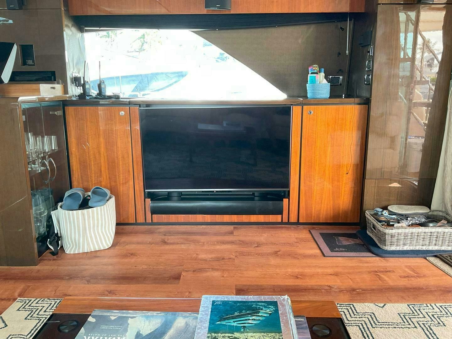 a room with a fireplace and a television aboard NONE Yacht for Sale