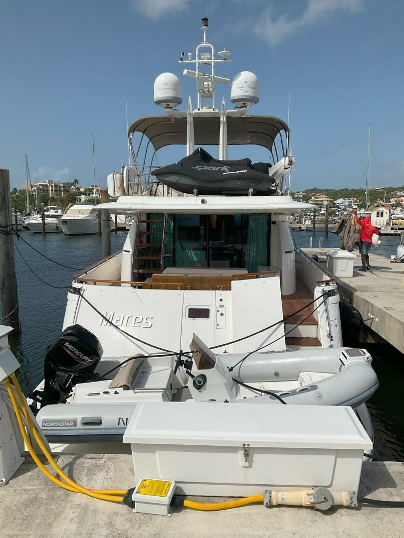 a boat with a large ship in the water aboard NONE Yacht for Sale
