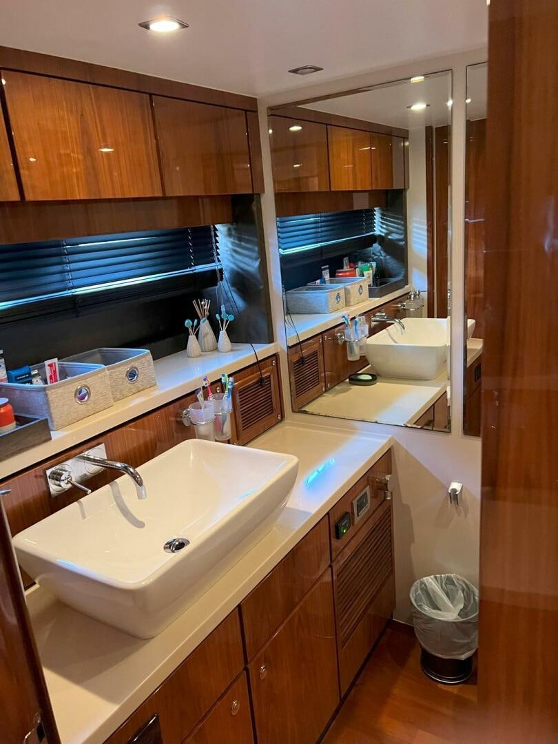 a bathroom with a sink and a mirror aboard NONE Yacht for Sale