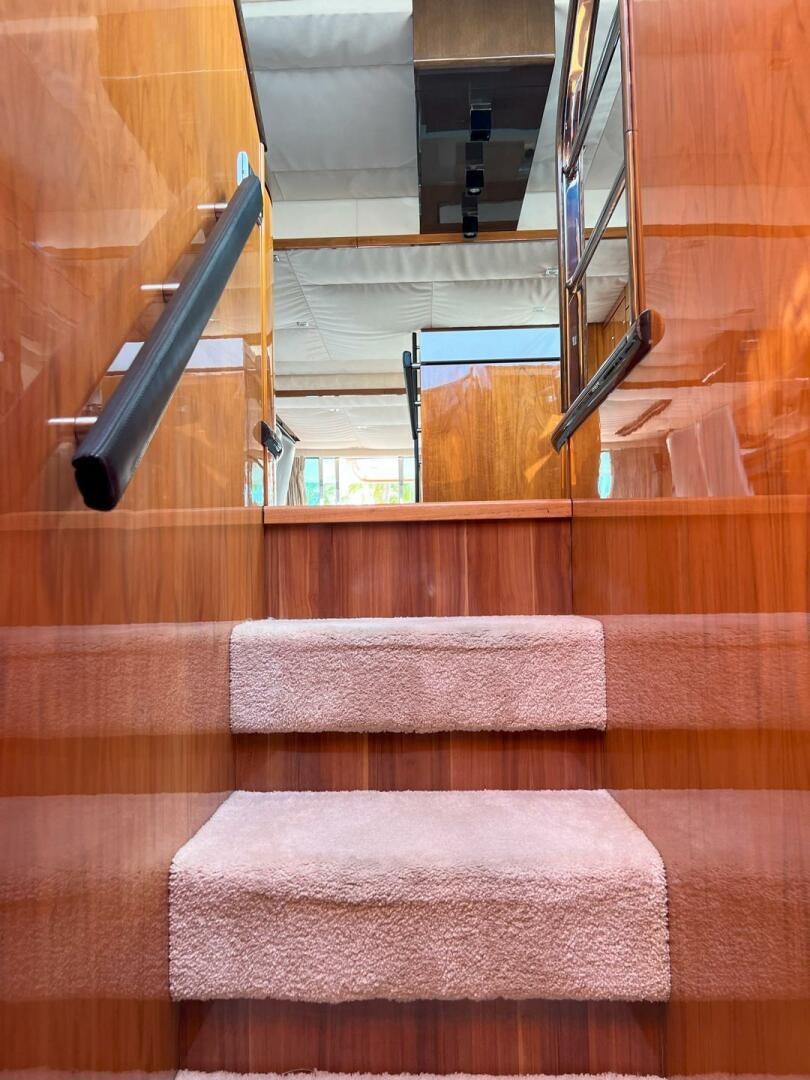 a bed with a guitar on it aboard NONE Yacht for Sale