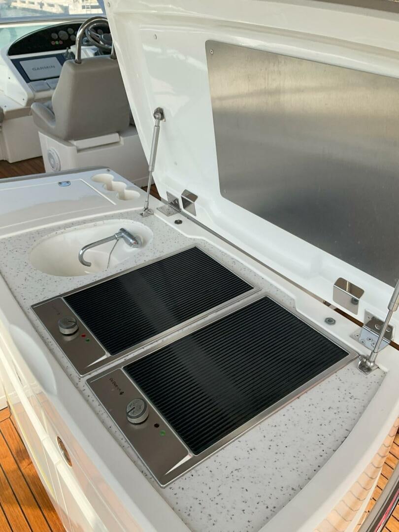 a white washing machine aboard NONE Yacht for Sale