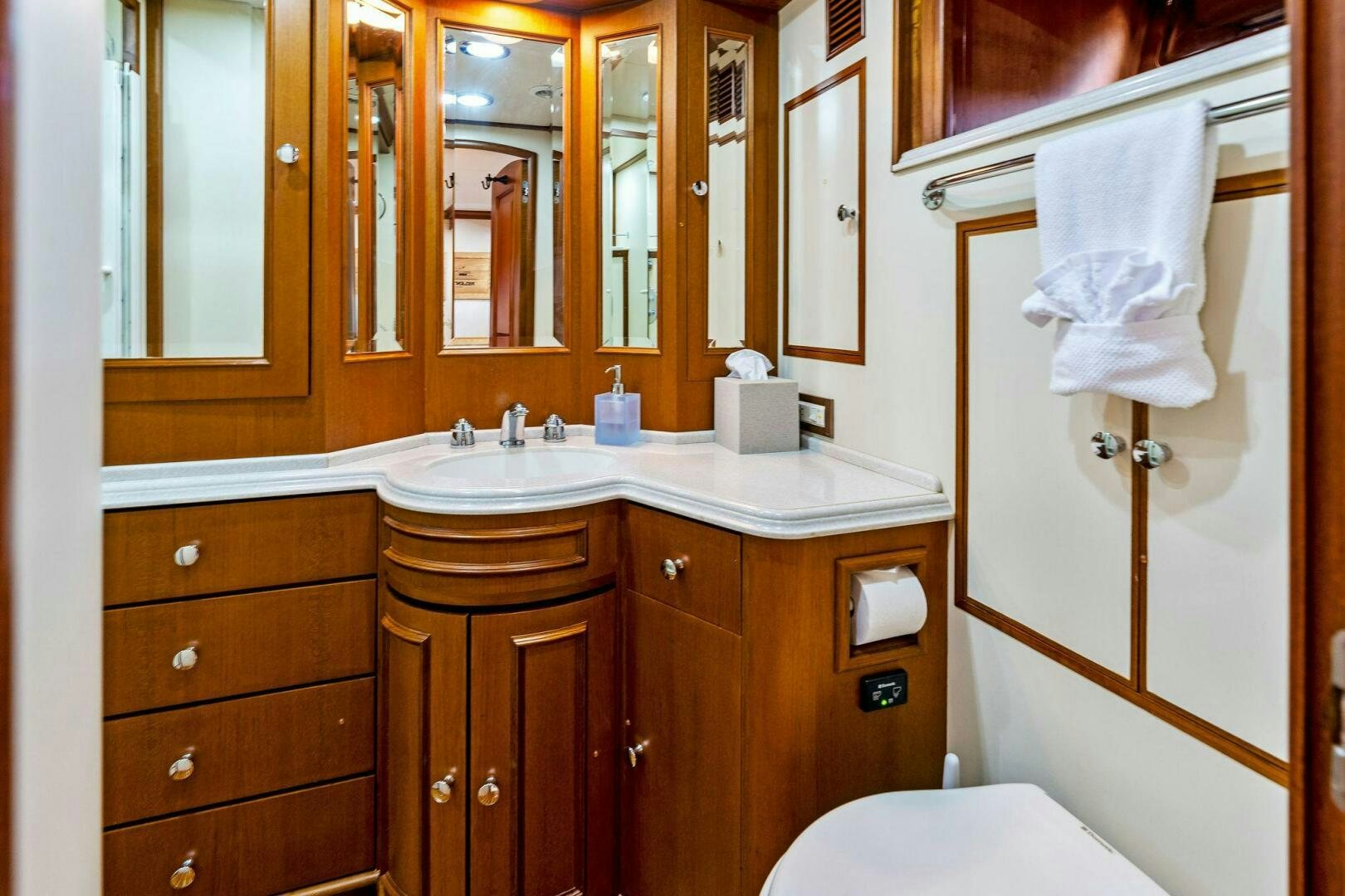 a bathroom with a sink and a toilet aboard RELENTLESS Yacht for Sale
