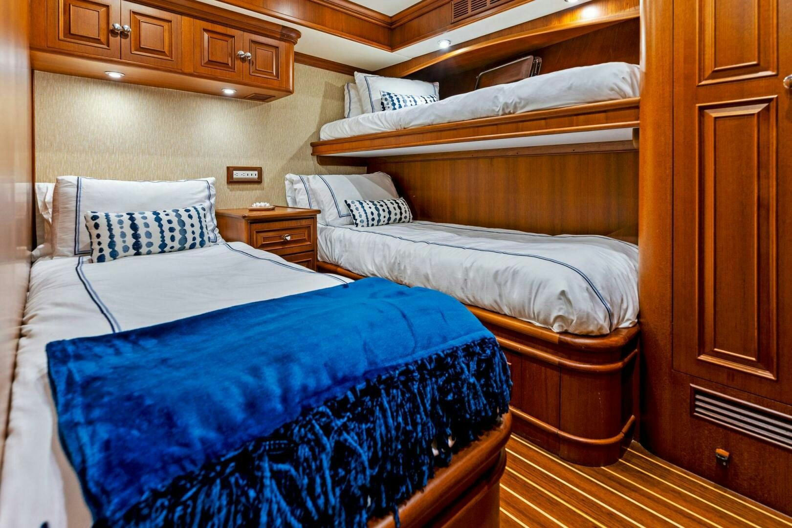 a room with bunk beds aboard RELENTLESS Yacht for Sale