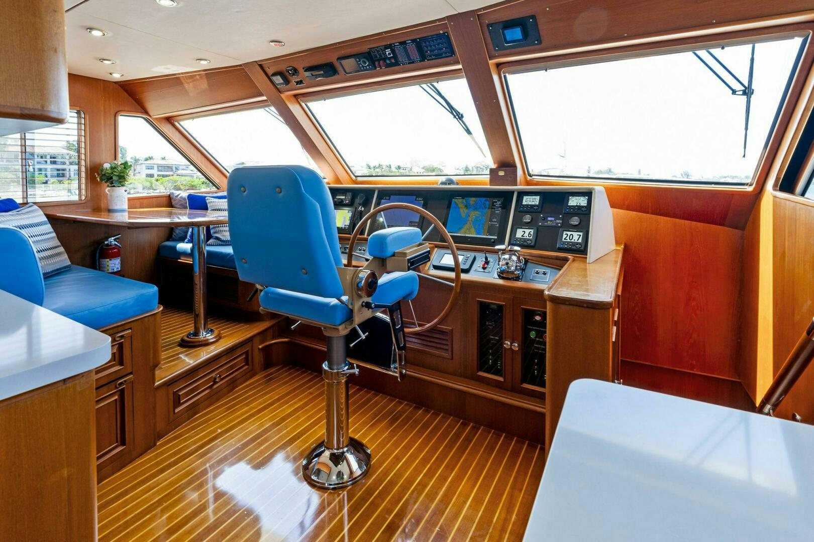 a room with a desk and chairs aboard RELENTLESS Yacht for Sale