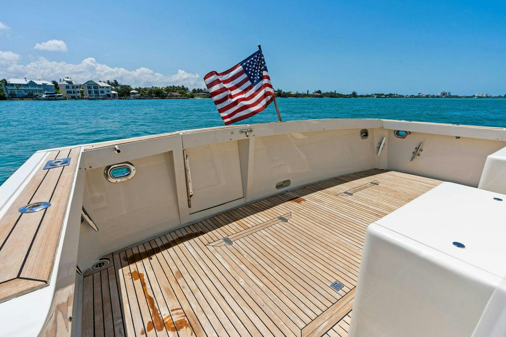 a flag on the back of a boat aboard RELENTLESS Yacht for Sale