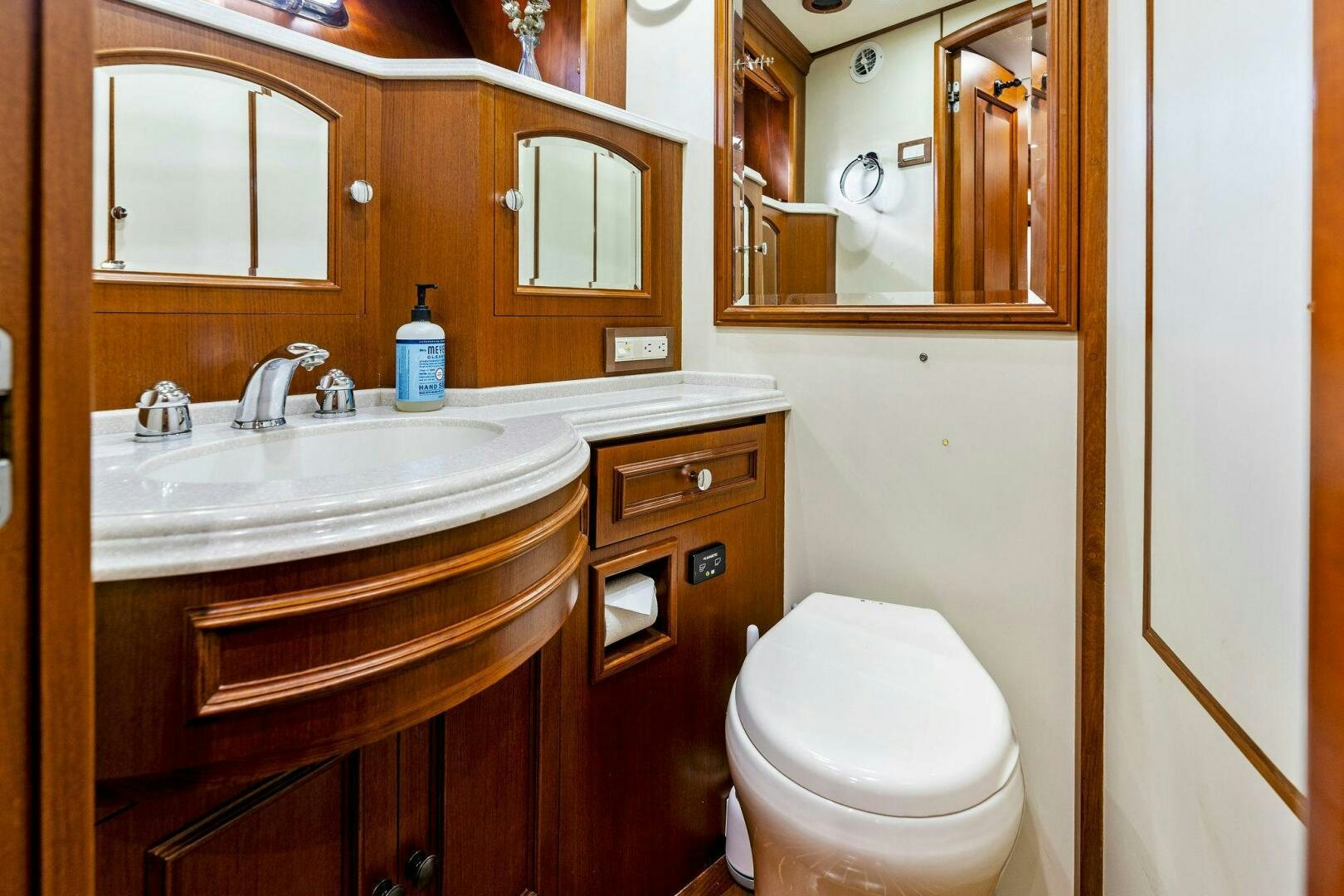 a bathroom with a sink and toilet aboard RELENTLESS Yacht for Sale