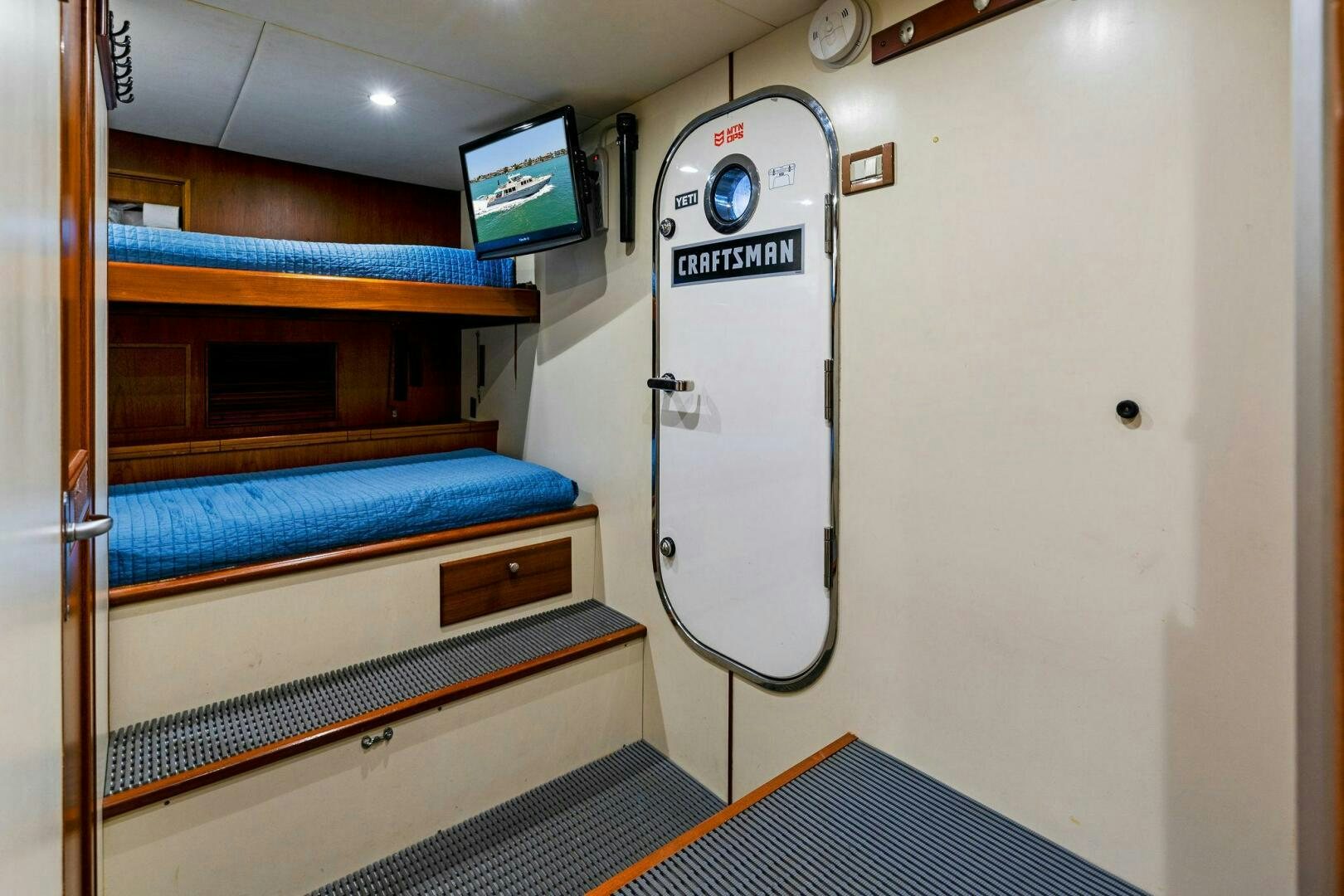 a hospital bed with a blue sheet aboard RELENTLESS Yacht for Sale