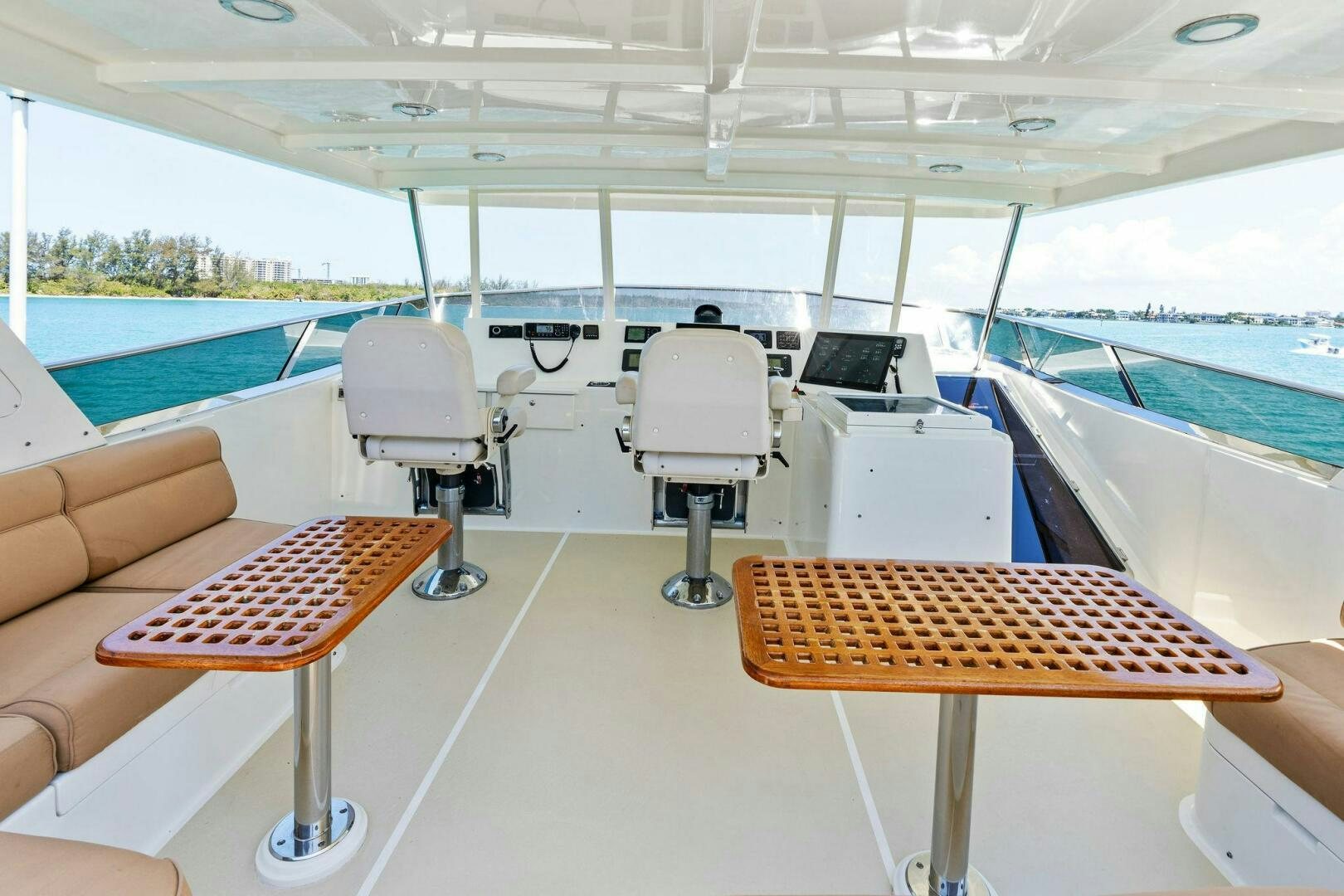 a room with a table and chairs aboard RELENTLESS Yacht for Sale