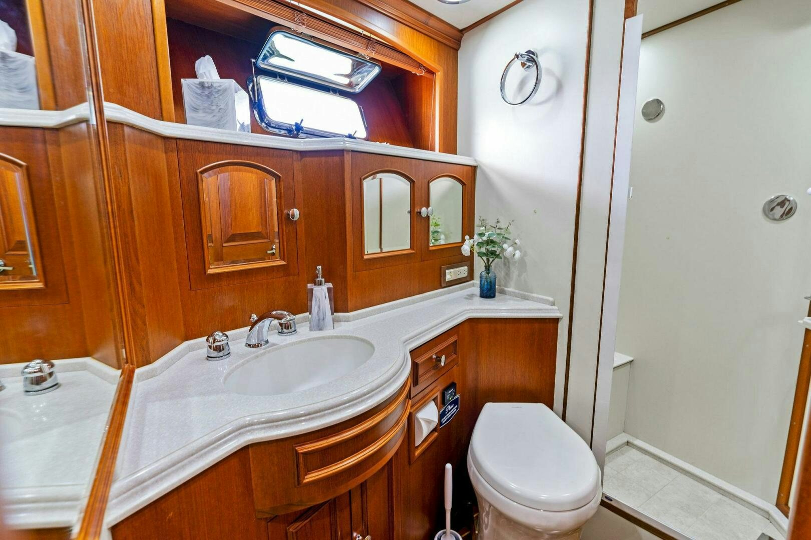 a bathroom with a sink and a toilet aboard RELENTLESS Yacht for Sale