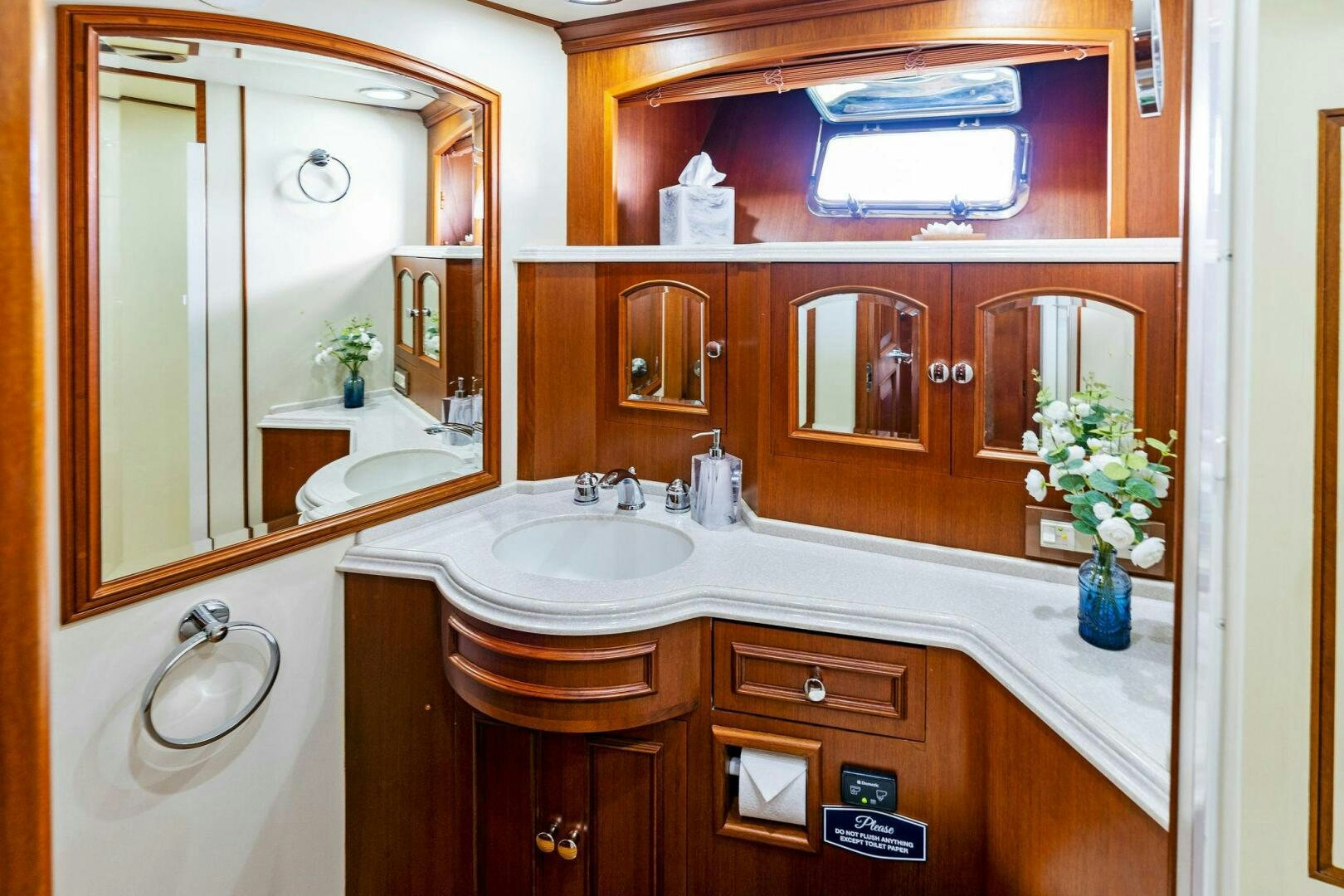 a bathroom with a large mirror aboard RELENTLESS Yacht for Sale