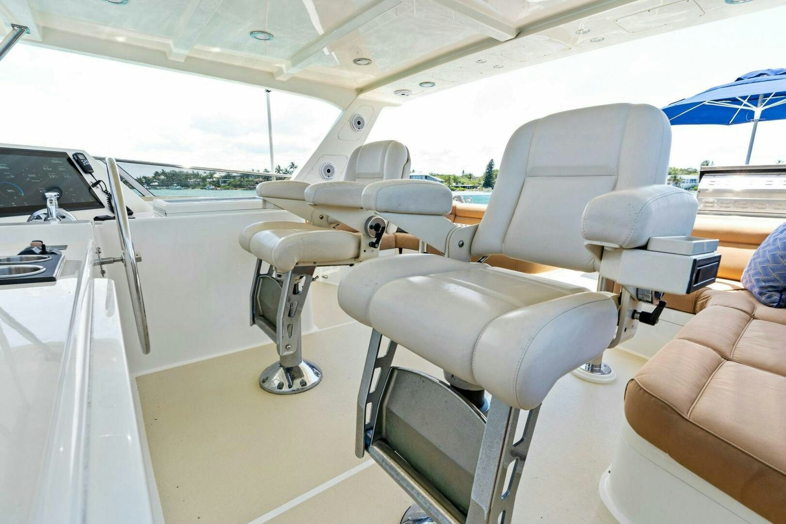 a group of seats in a car aboard RELENTLESS Yacht for Sale