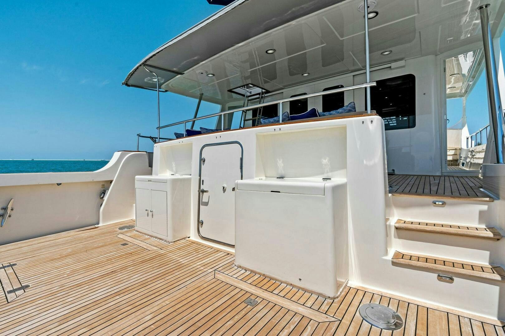 a large white boat in a large room aboard RELENTLESS Yacht for Sale
