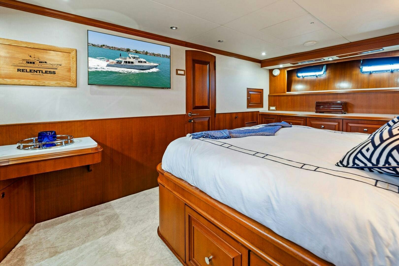 a room with two beds aboard RELENTLESS Yacht for Sale