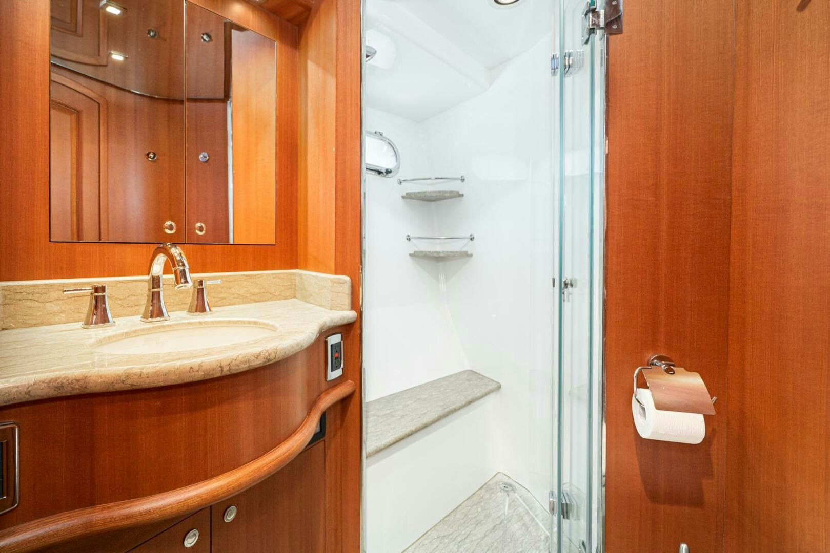 a bathroom with a sink and a mirror aboard KING OF NOTHING Yacht for Sale