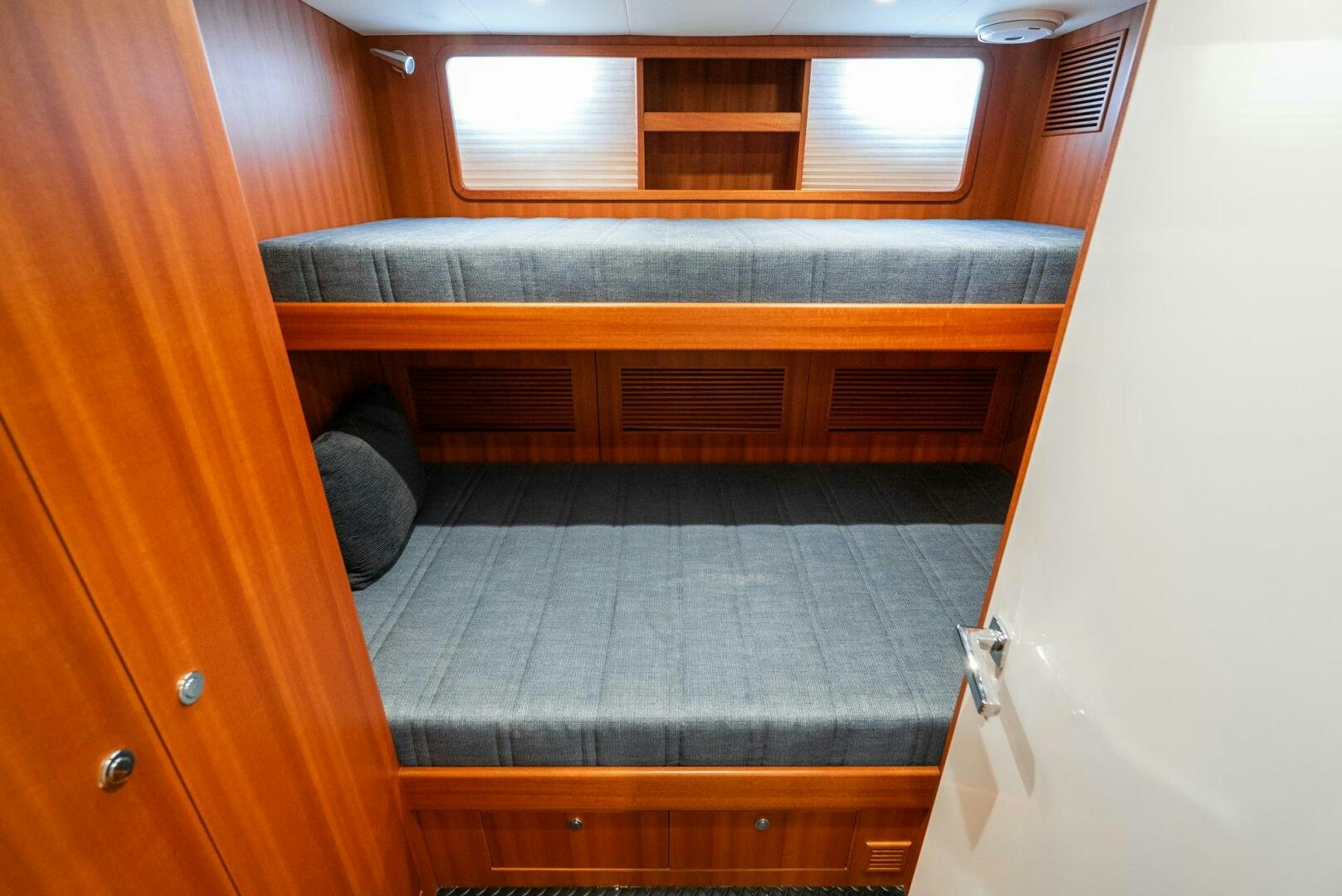 a room with a couch and a window aboard KING OF NOTHING Yacht for Sale
