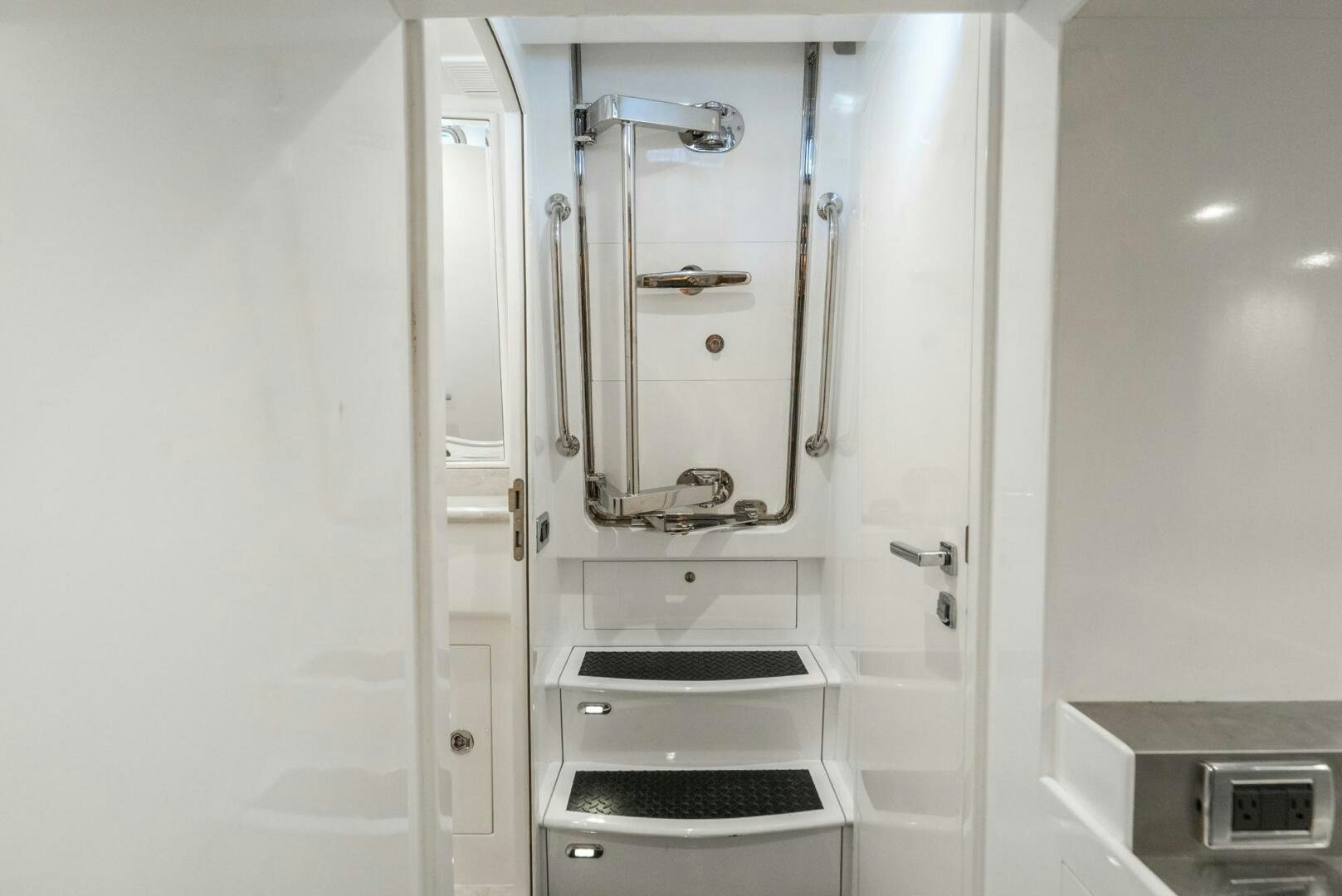 a white cabinet with drawers aboard KING OF NOTHING Yacht for Sale
