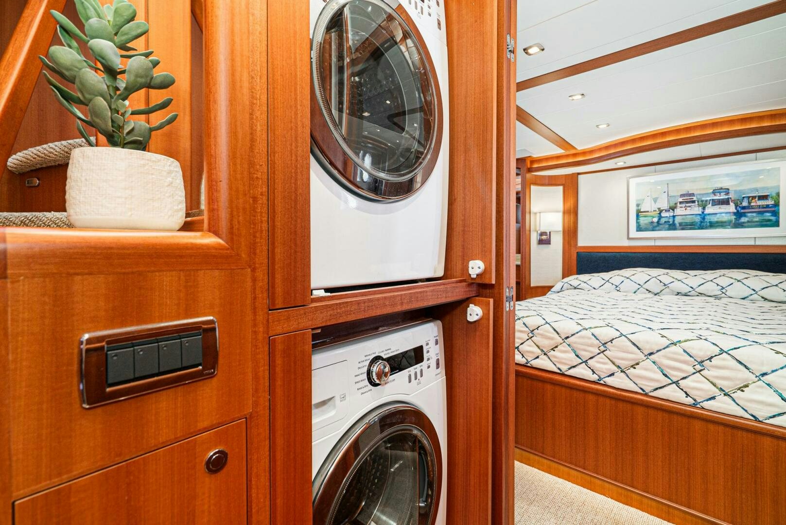 a kitchen with a washing machine aboard KING OF NOTHING Yacht for Sale