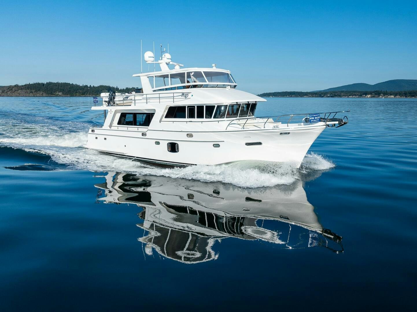 a white boat on the water aboard KING OF NOTHING Yacht for Sale
