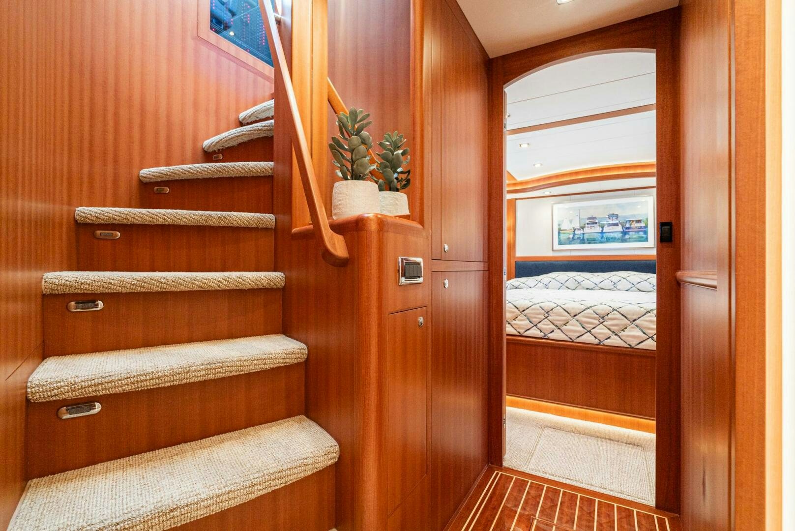 a wooden staircase in a house aboard KING OF NOTHING Yacht for Sale