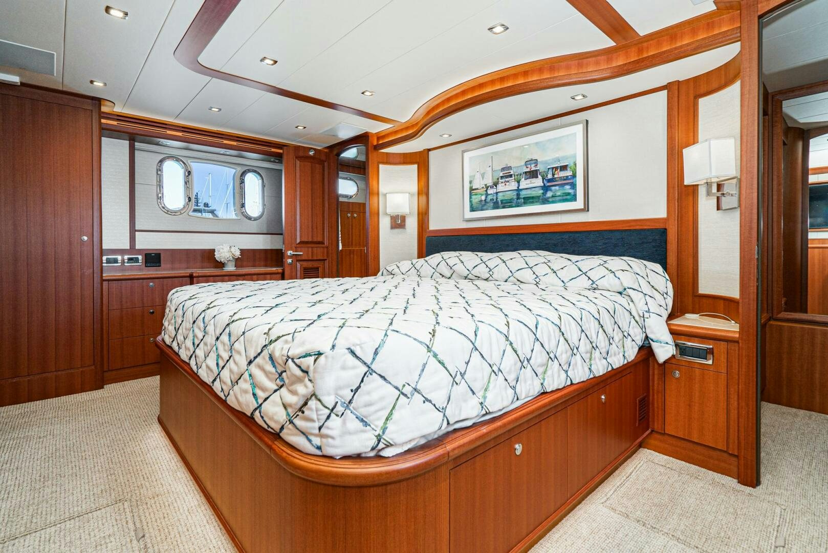 a bedroom with a large bed aboard KING OF NOTHING Yacht for Sale