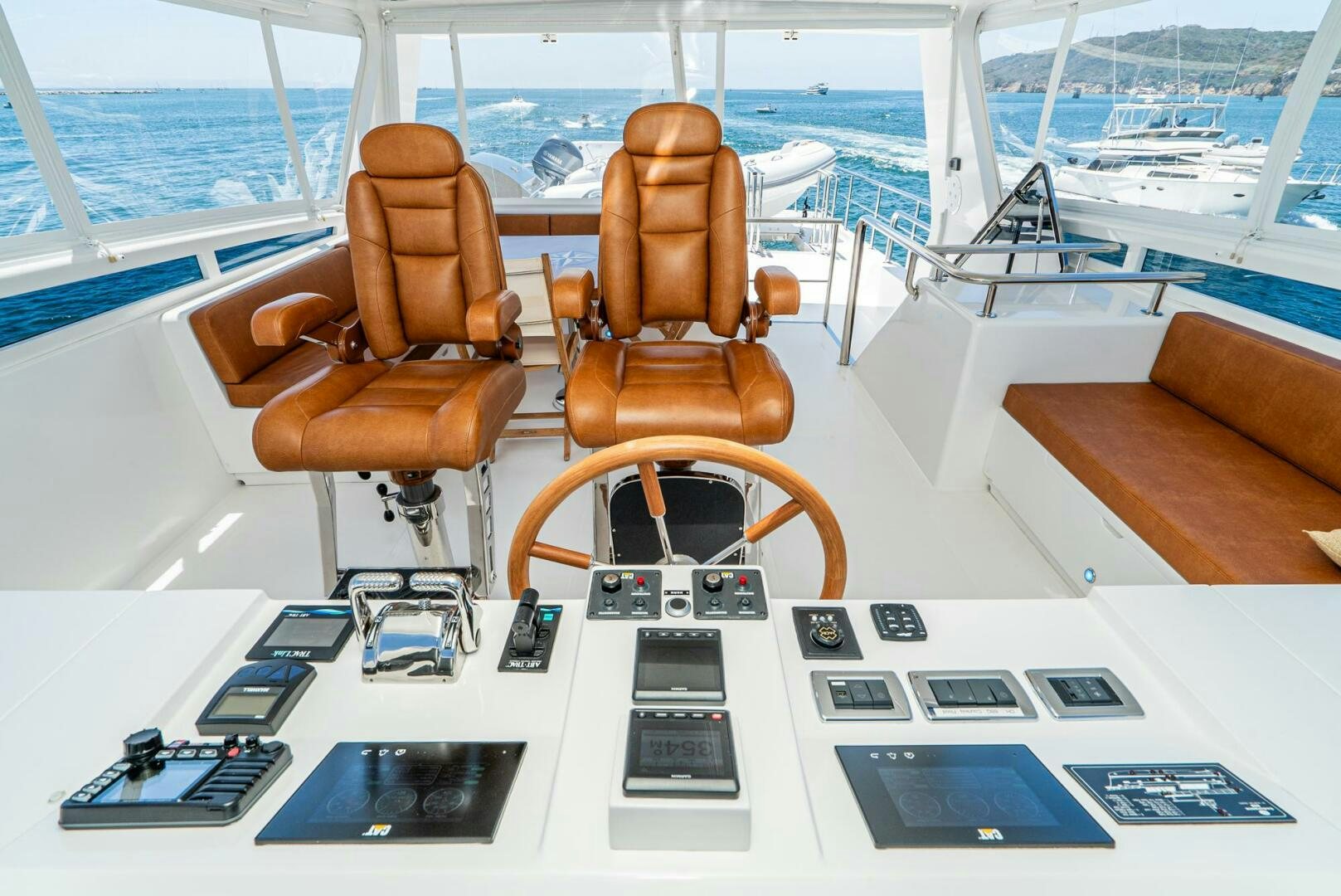an orange and white robot on a boat aboard KING OF NOTHING Yacht for Sale