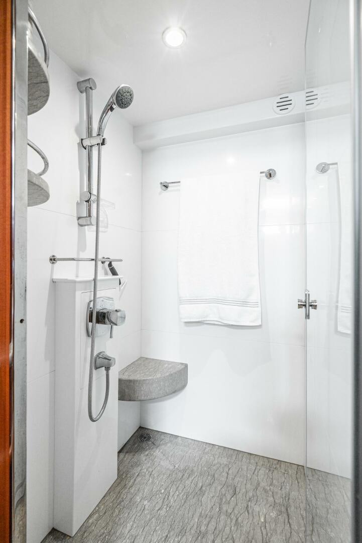 a shower unit in a bathroom aboard KING OF NOTHING Yacht for Sale