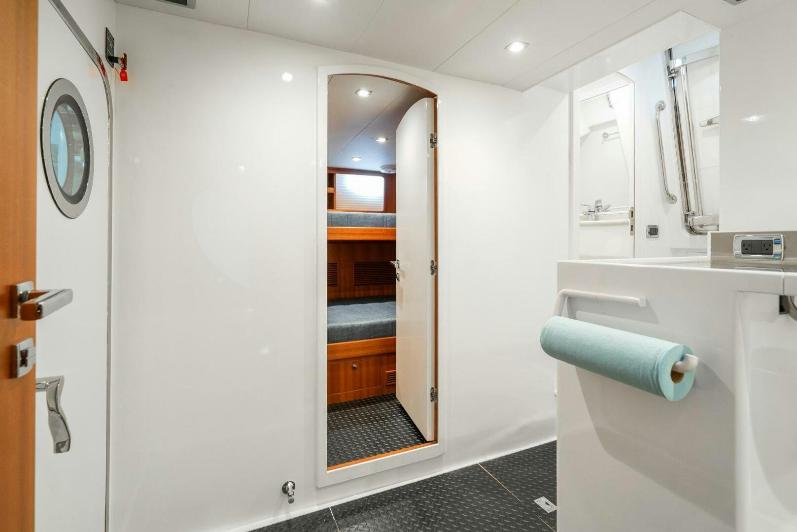 a bathroom with a glass door aboard KING OF NOTHING Yacht for Sale
