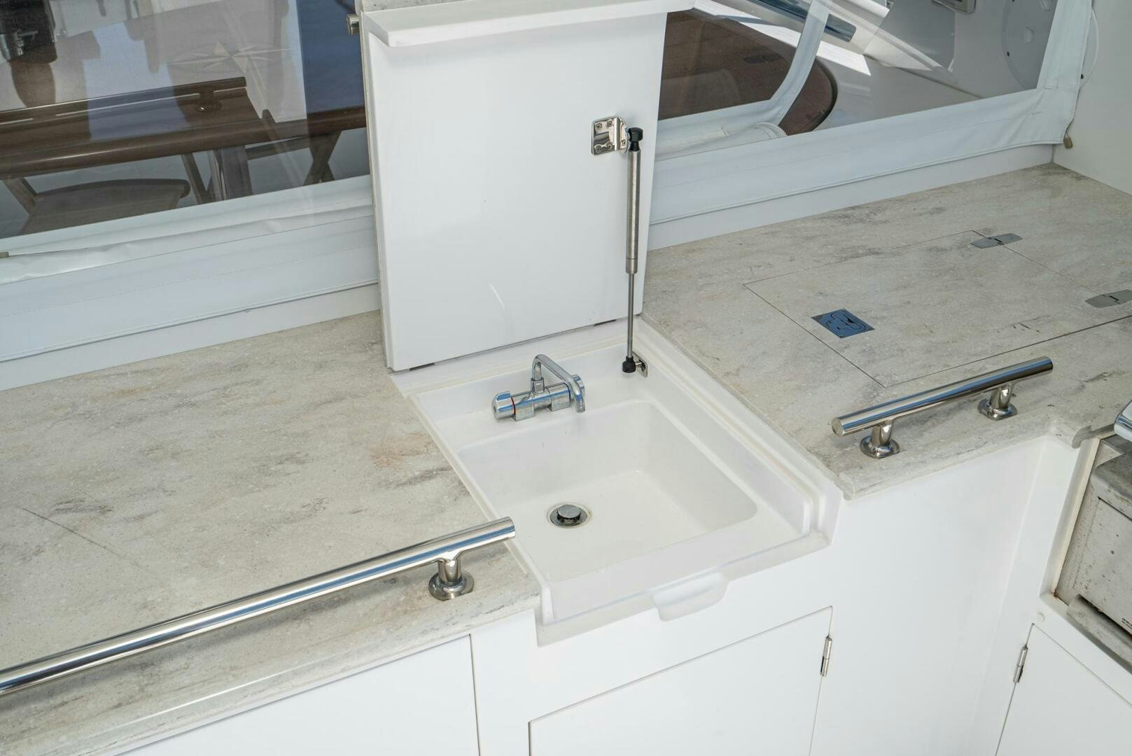 a bathroom with a sink and a bathtub aboard KING OF NOTHING Yacht for Sale