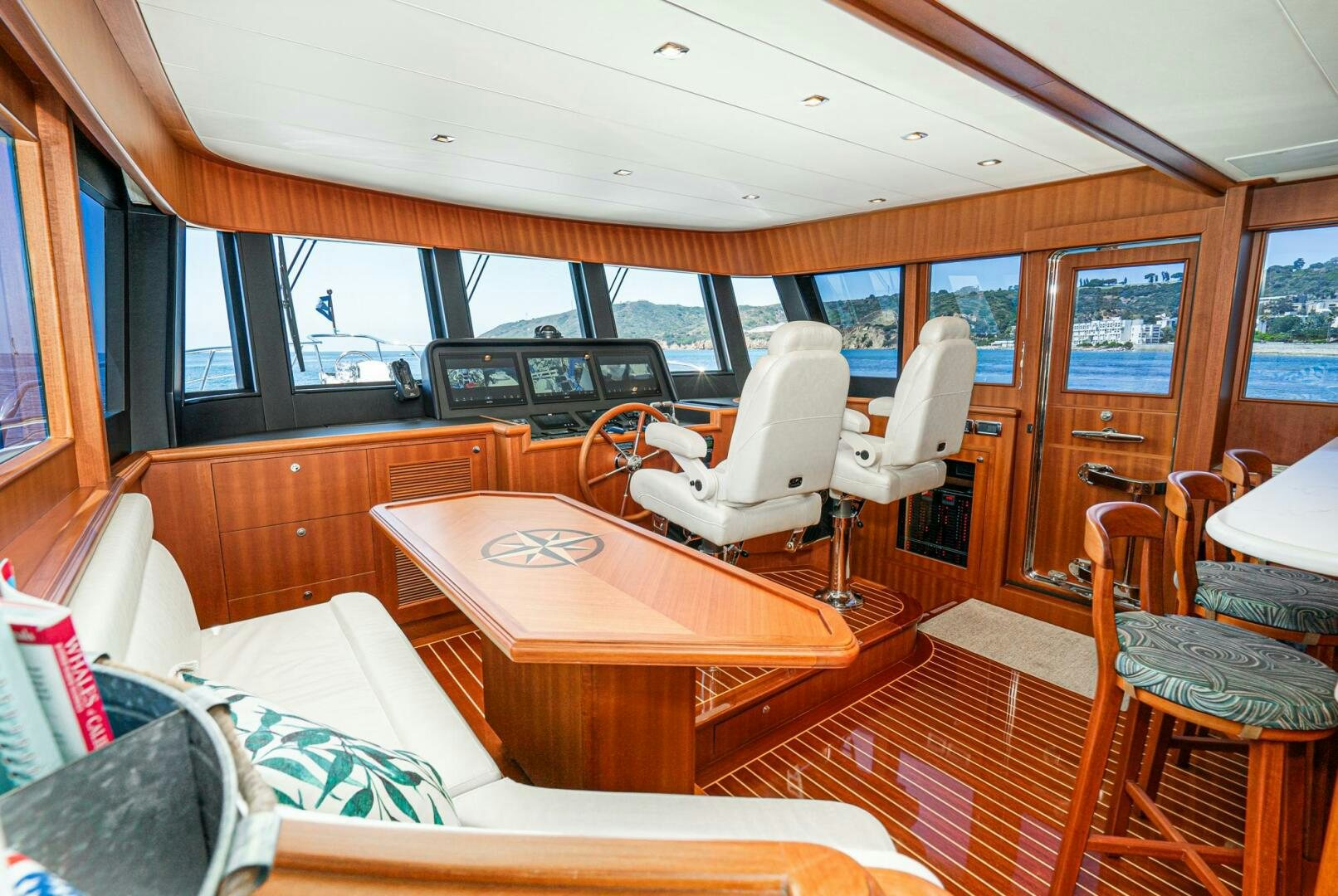 a boat with a table and chairs aboard KING OF NOTHING Yacht for Sale