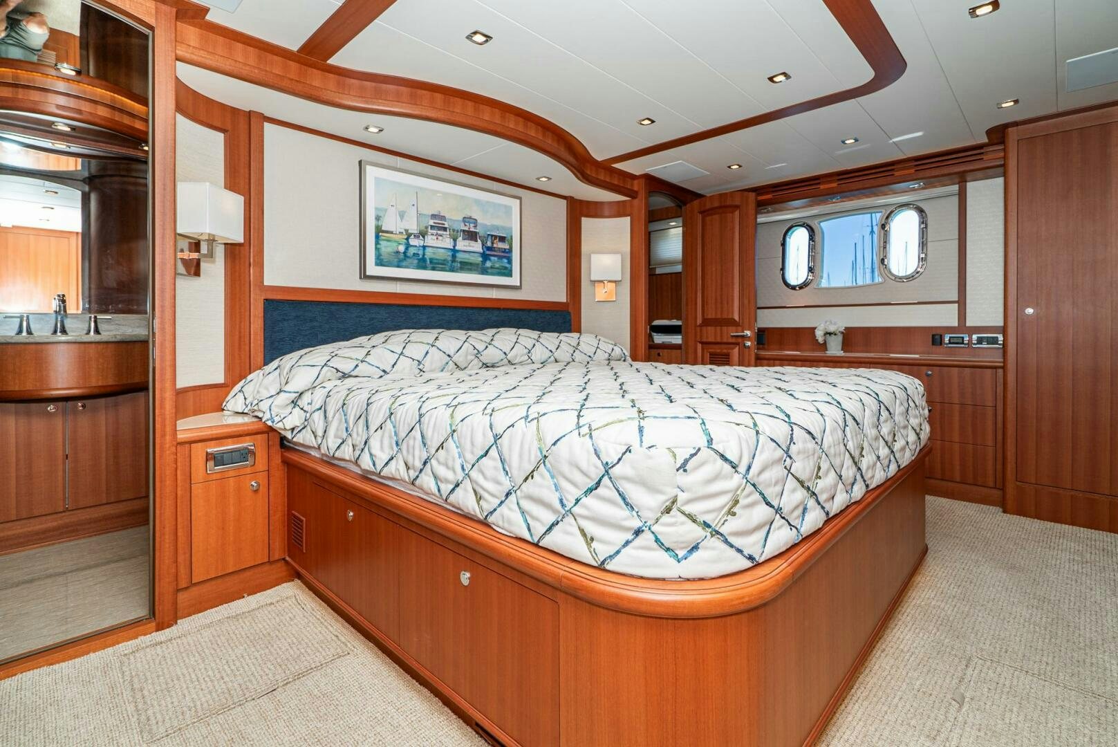a large bedroom with a large bed aboard KING OF NOTHING Yacht for Sale