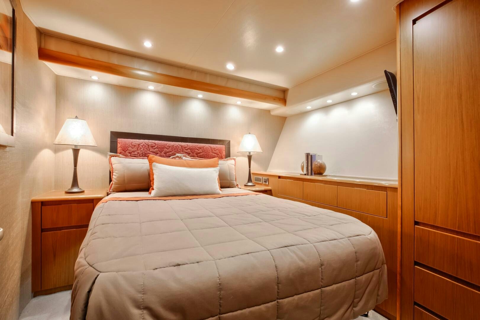 a bed with a white pillow aboard DONE DEAL Yacht for Sale