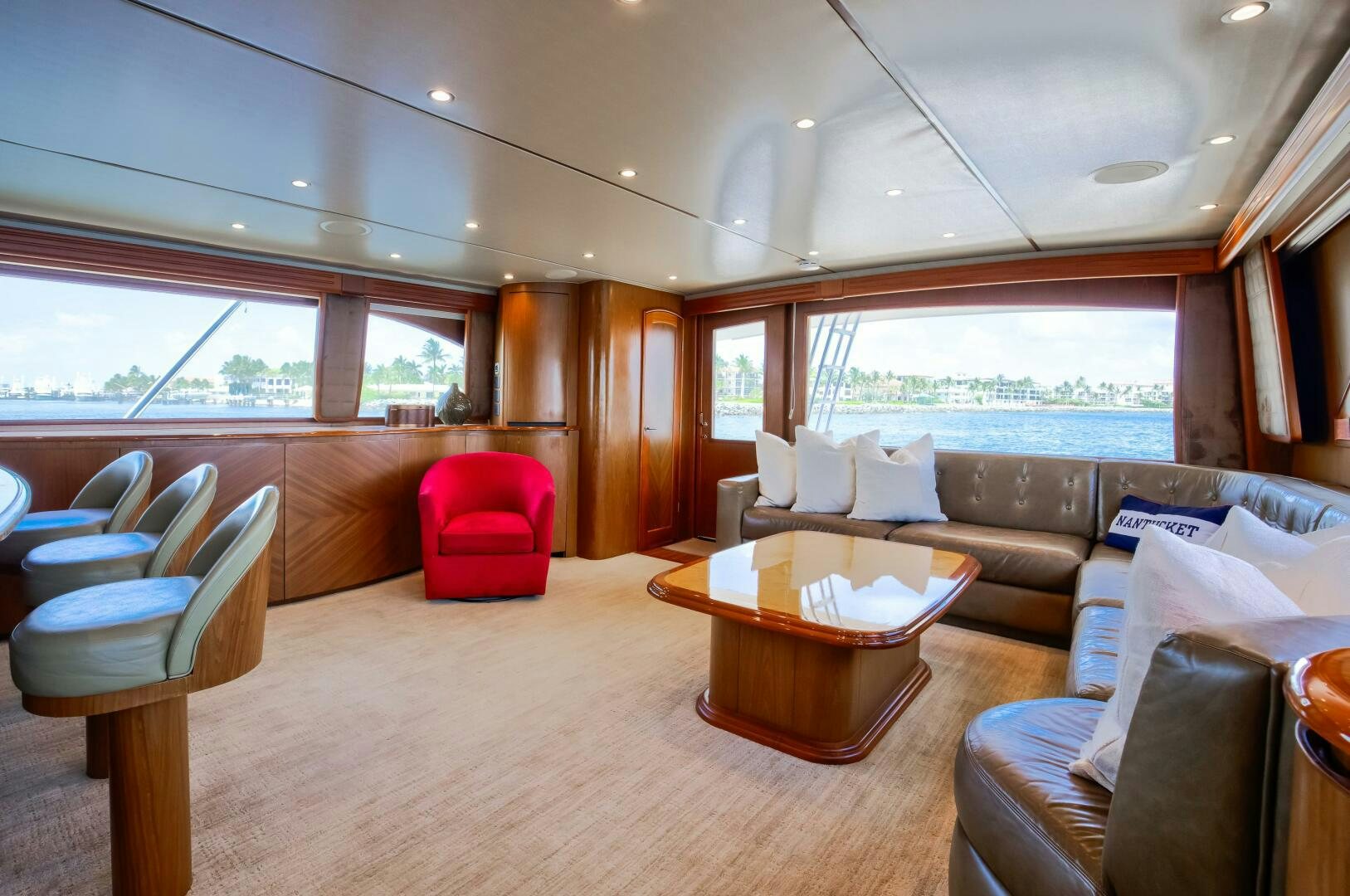 a living room with a couch and a table aboard DONE DEAL Yacht for Sale