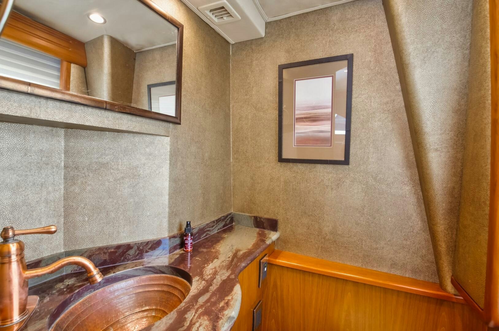 a bathroom with a marble countertop aboard DONE DEAL Yacht for Sale