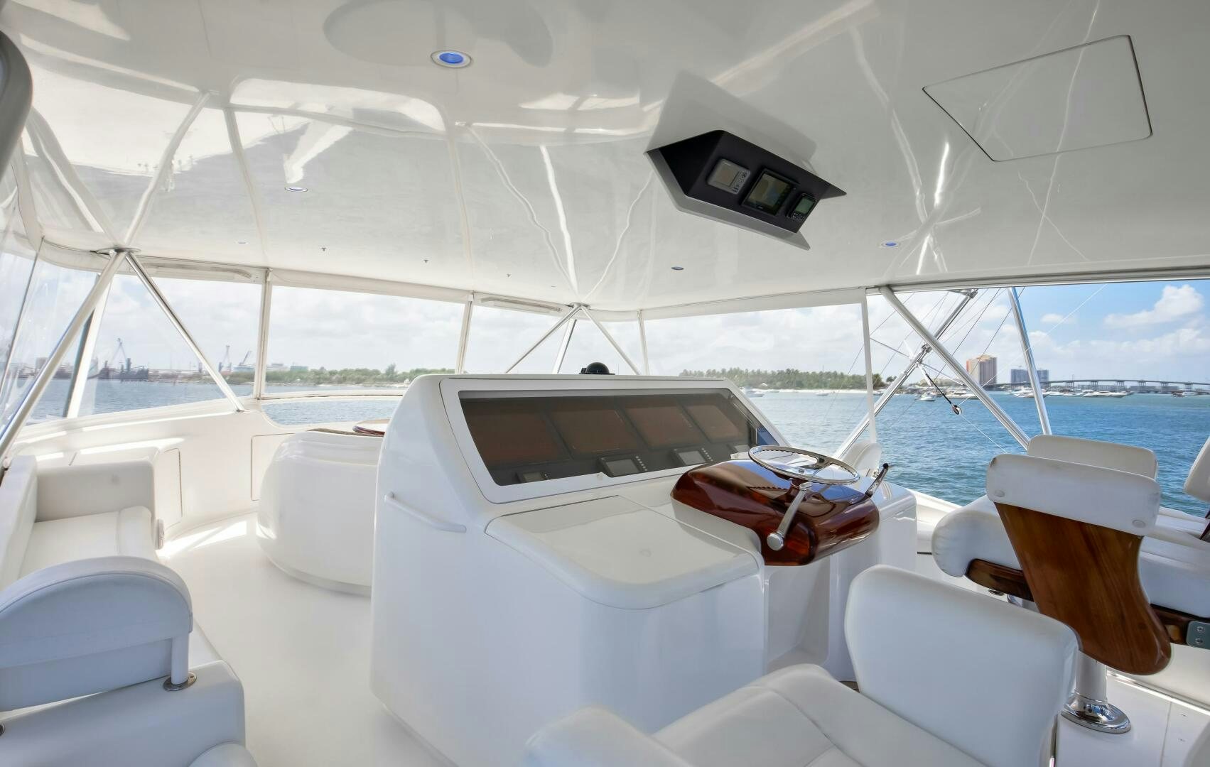 a boat with a table and chairs aboard DONE DEAL Yacht for Sale