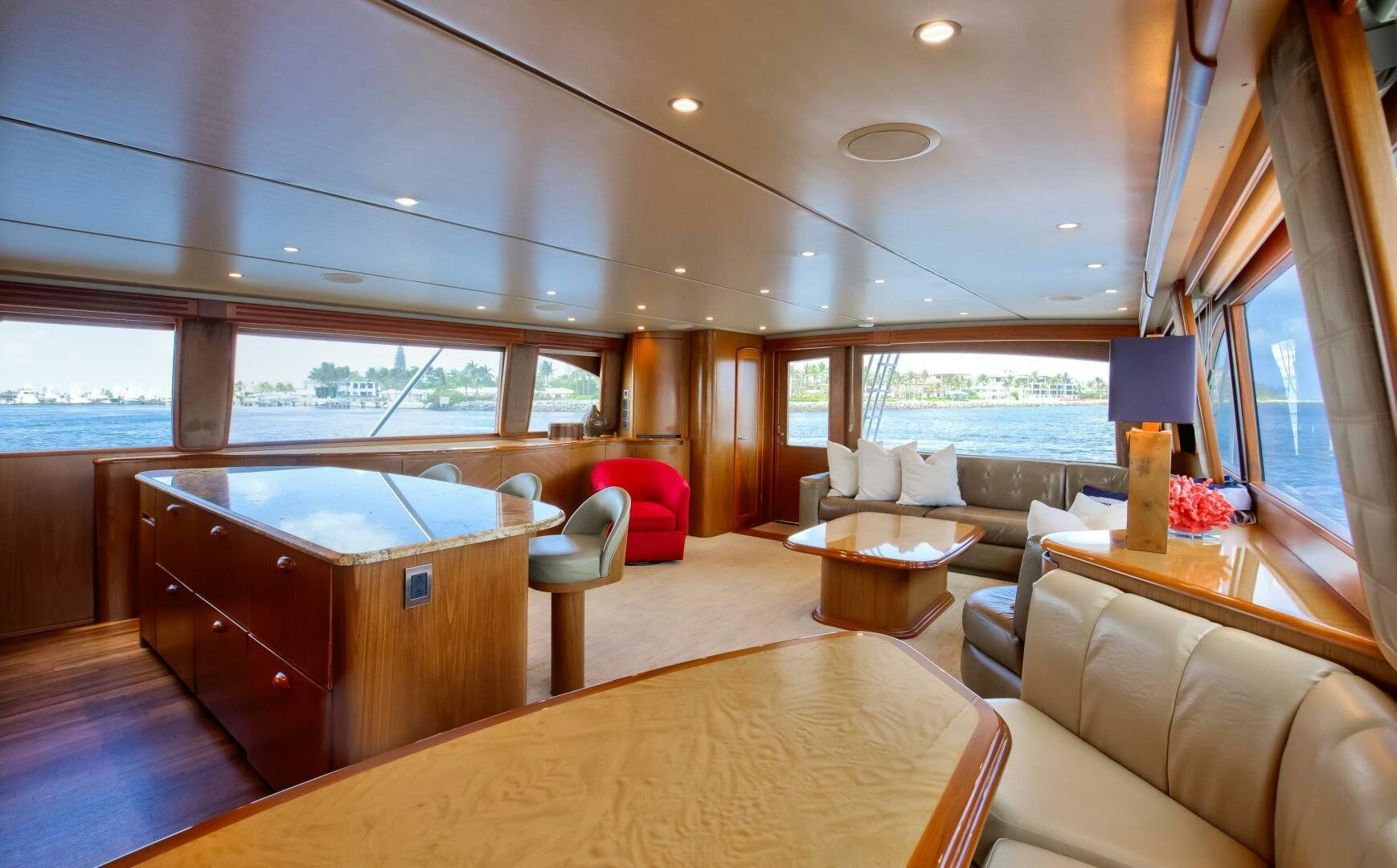 a large living room with a large window aboard DONE DEAL Yacht for Sale