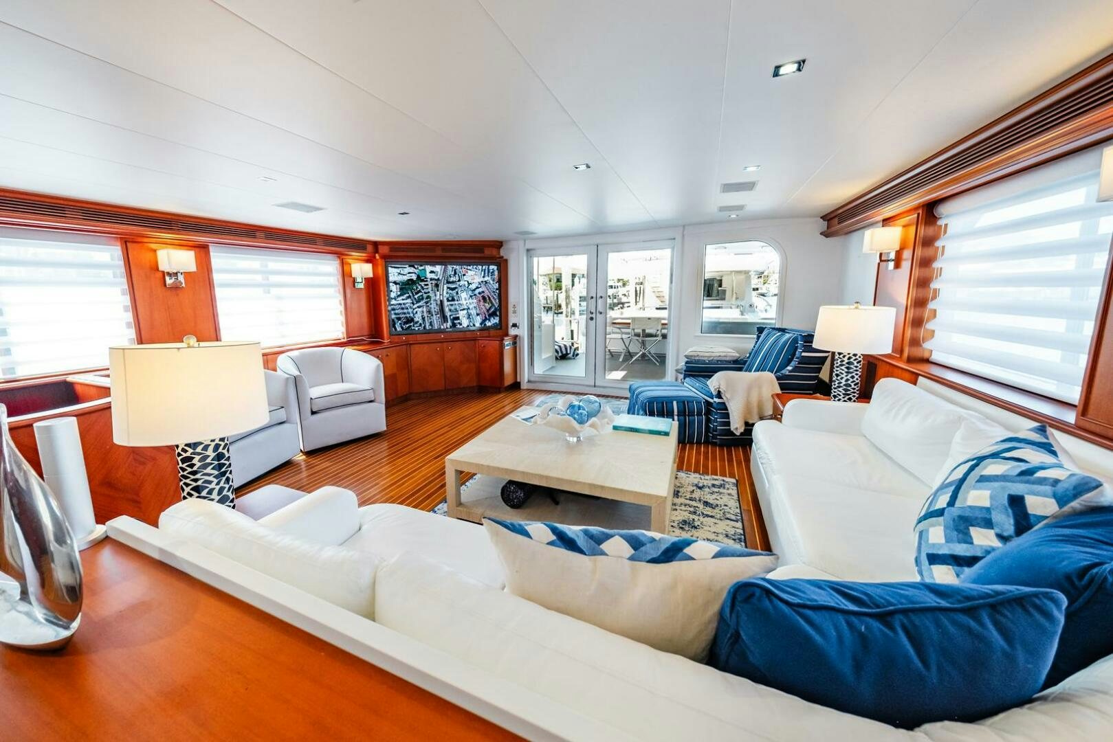 a living room with a large window aboard GRACE Yacht for Sale
