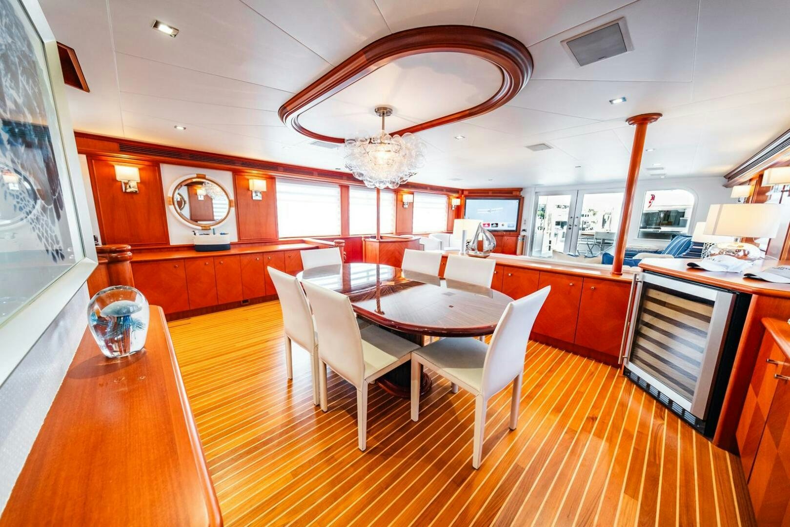 a large kitchen with a dining table aboard GRACE Yacht for Sale