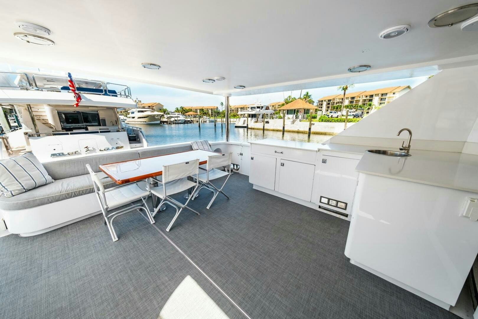 a large white boat in a large body of water aboard GRACE Yacht for Sale
