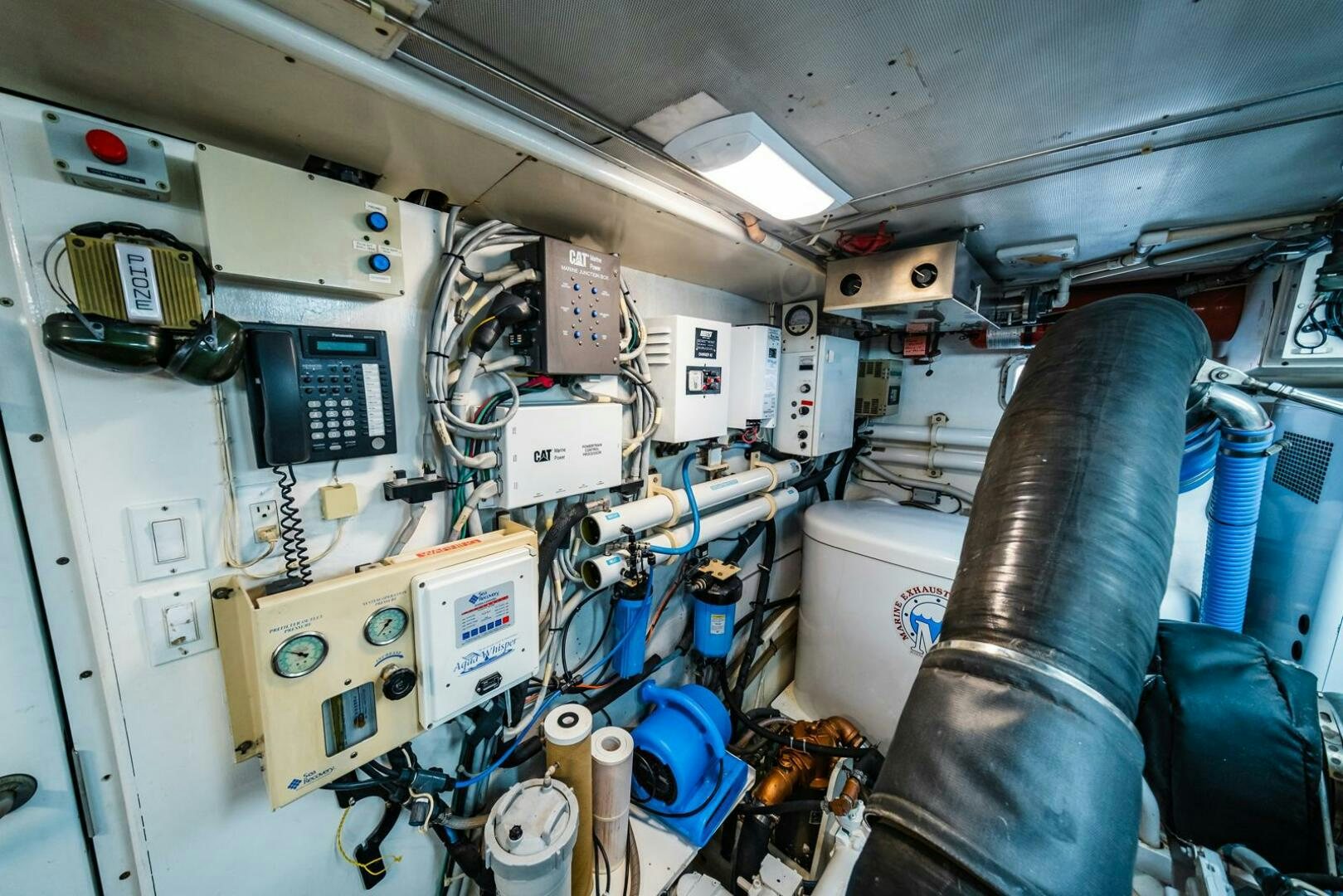 a room with a bunch of electronics aboard GRACE Yacht for Sale
