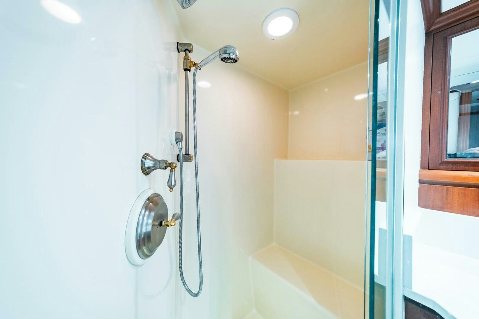 a bathroom with a shower unit aboard GRACE Yacht for Sale