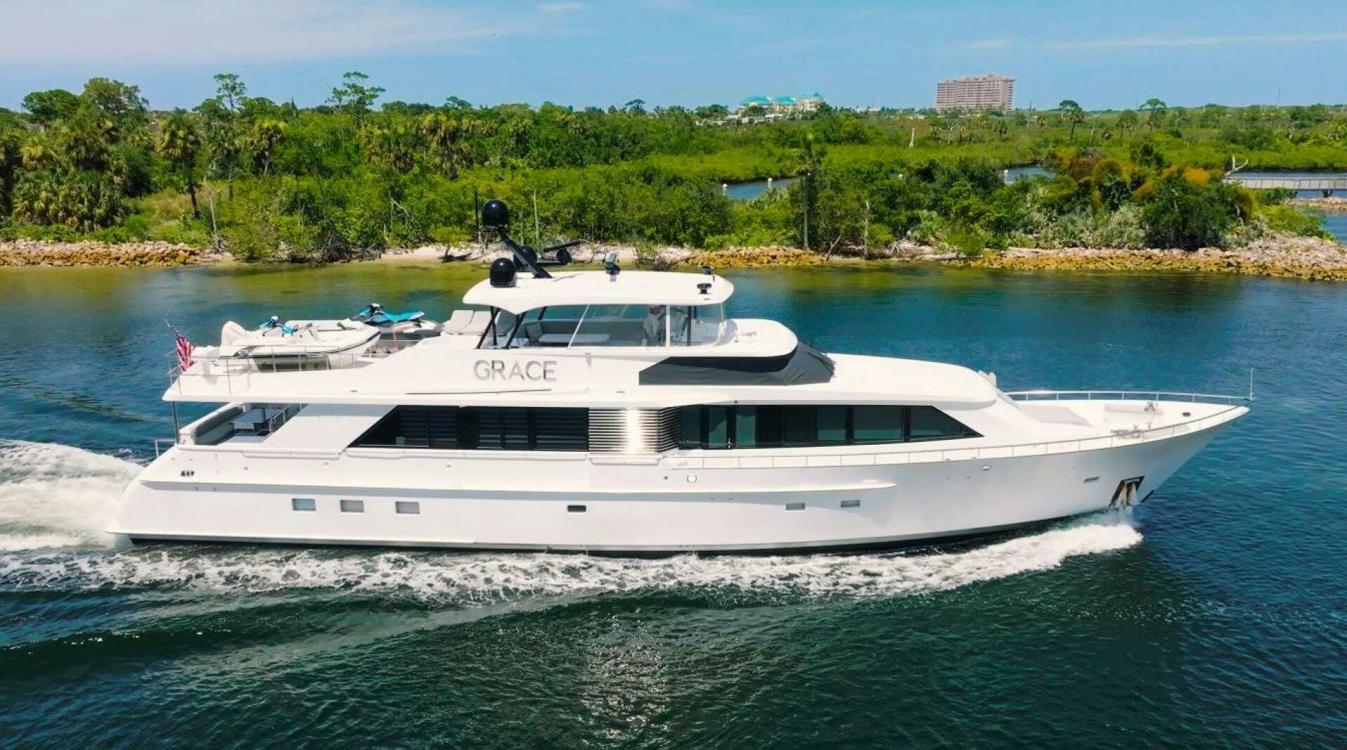 a white yacht on the water aboard GRACE Yacht for Sale