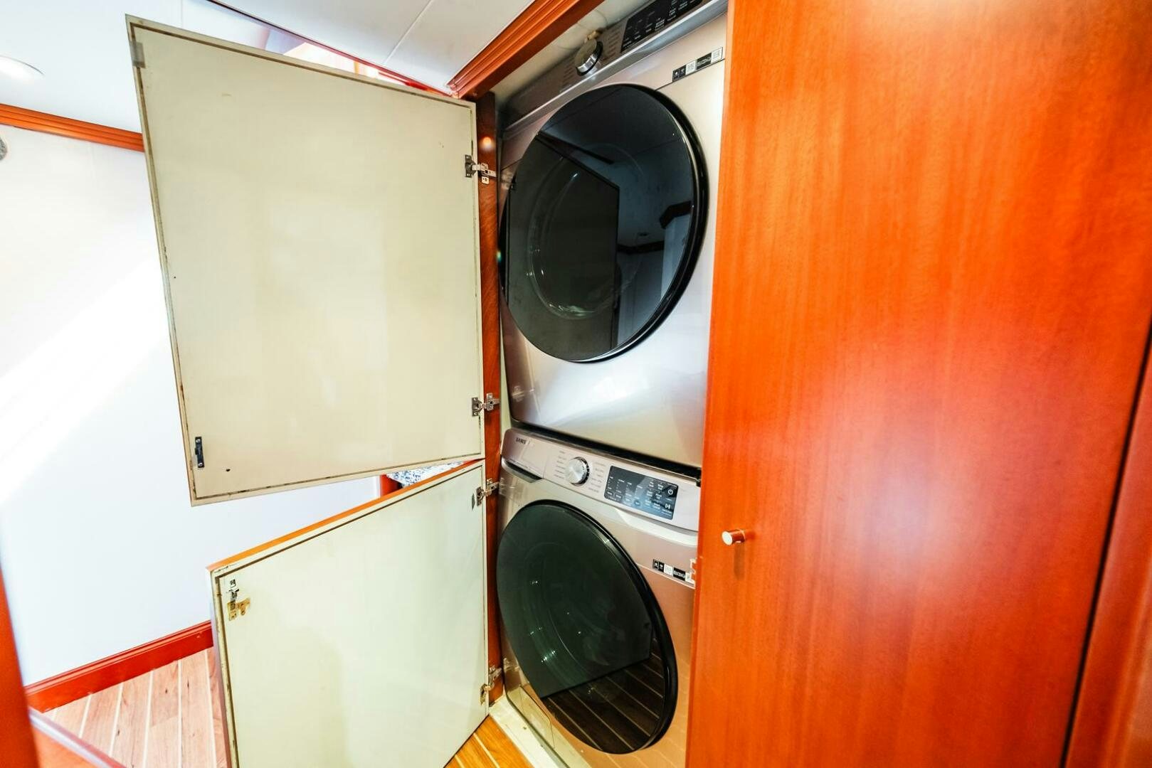 a washer and dryer in a room aboard GRACE Yacht for Sale