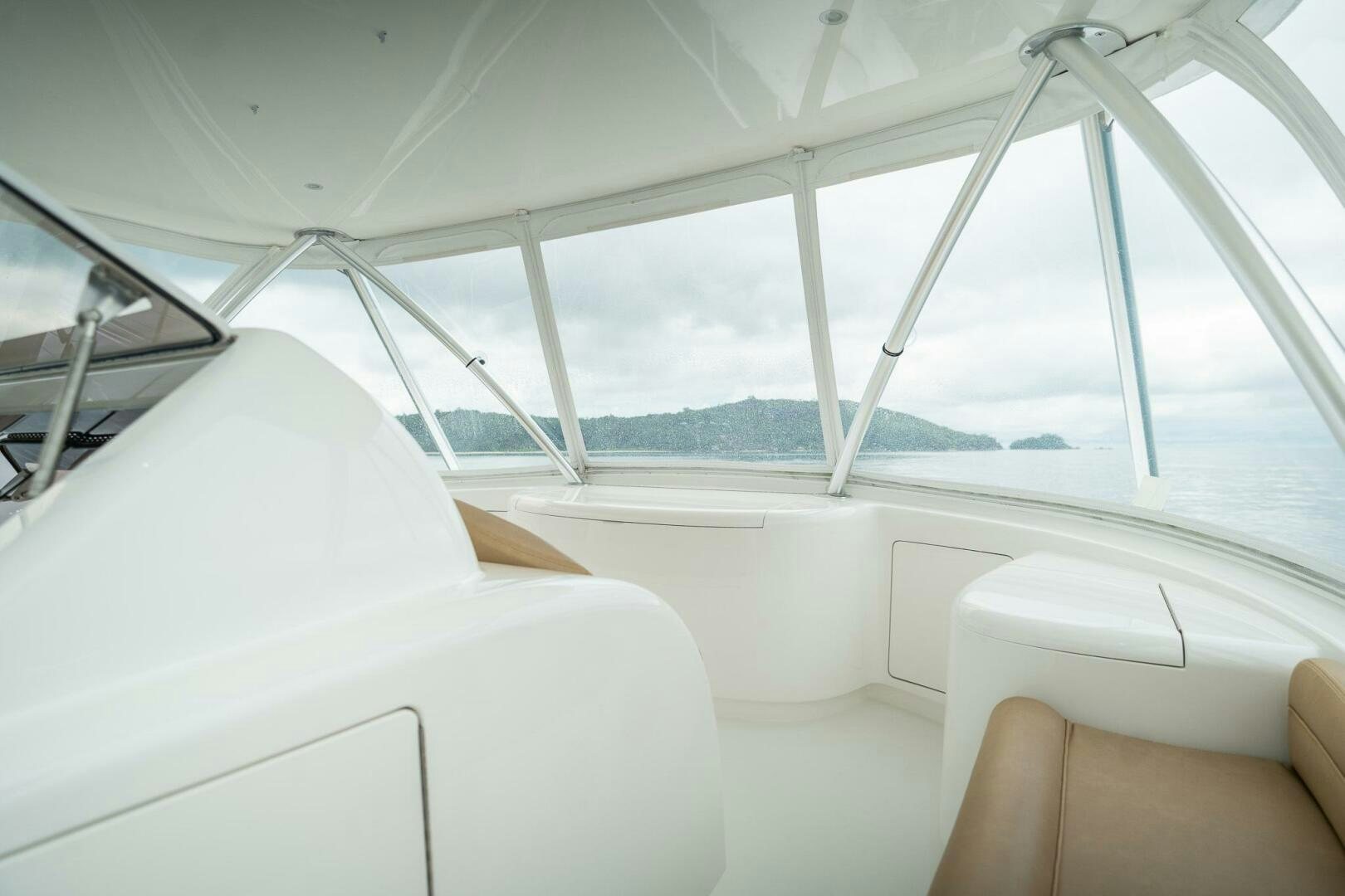 a room with a view of the ocean and the mountains aboard VOODOO Yacht for Sale