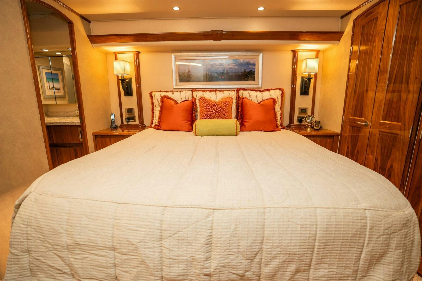 a bed with pillows aboard VOODOO Yacht for Sale